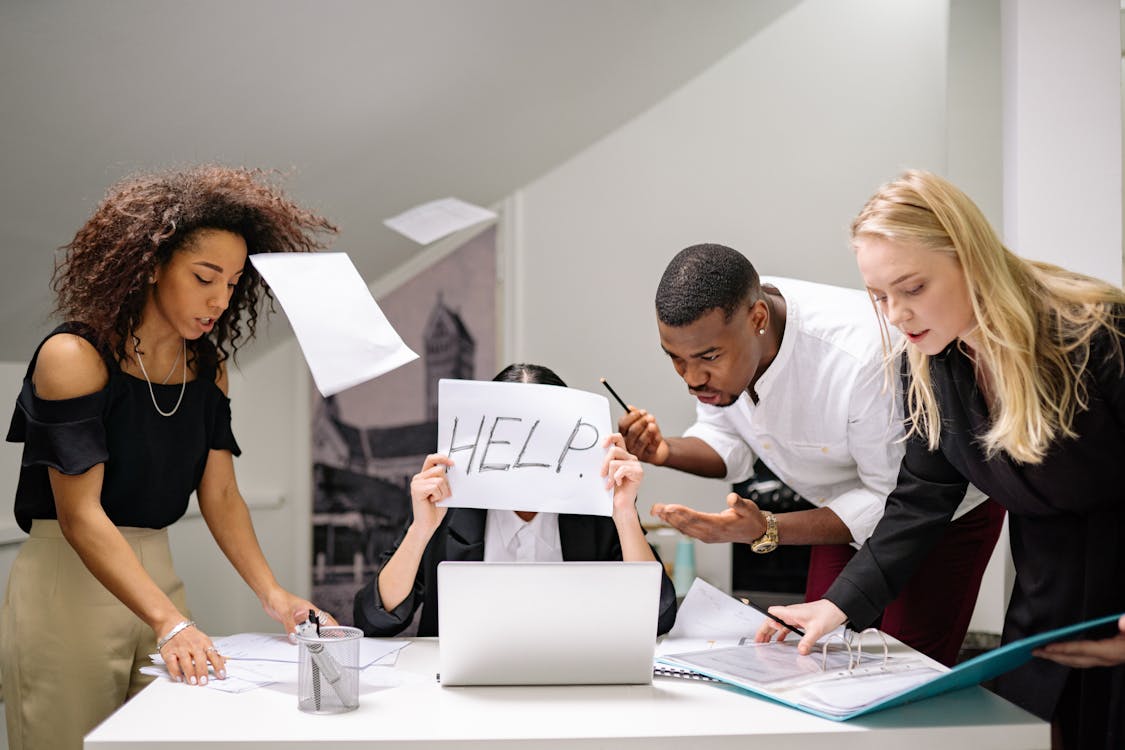 Business professionals discussing a loyalty program strategy in a modern office