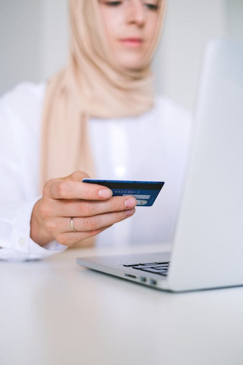 Woman using mobile app in luxury store