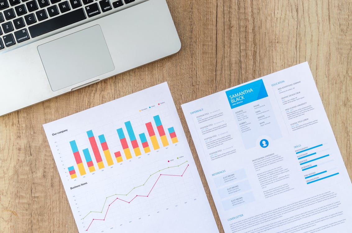 Businesswoman presenting loyalty program data in modern office