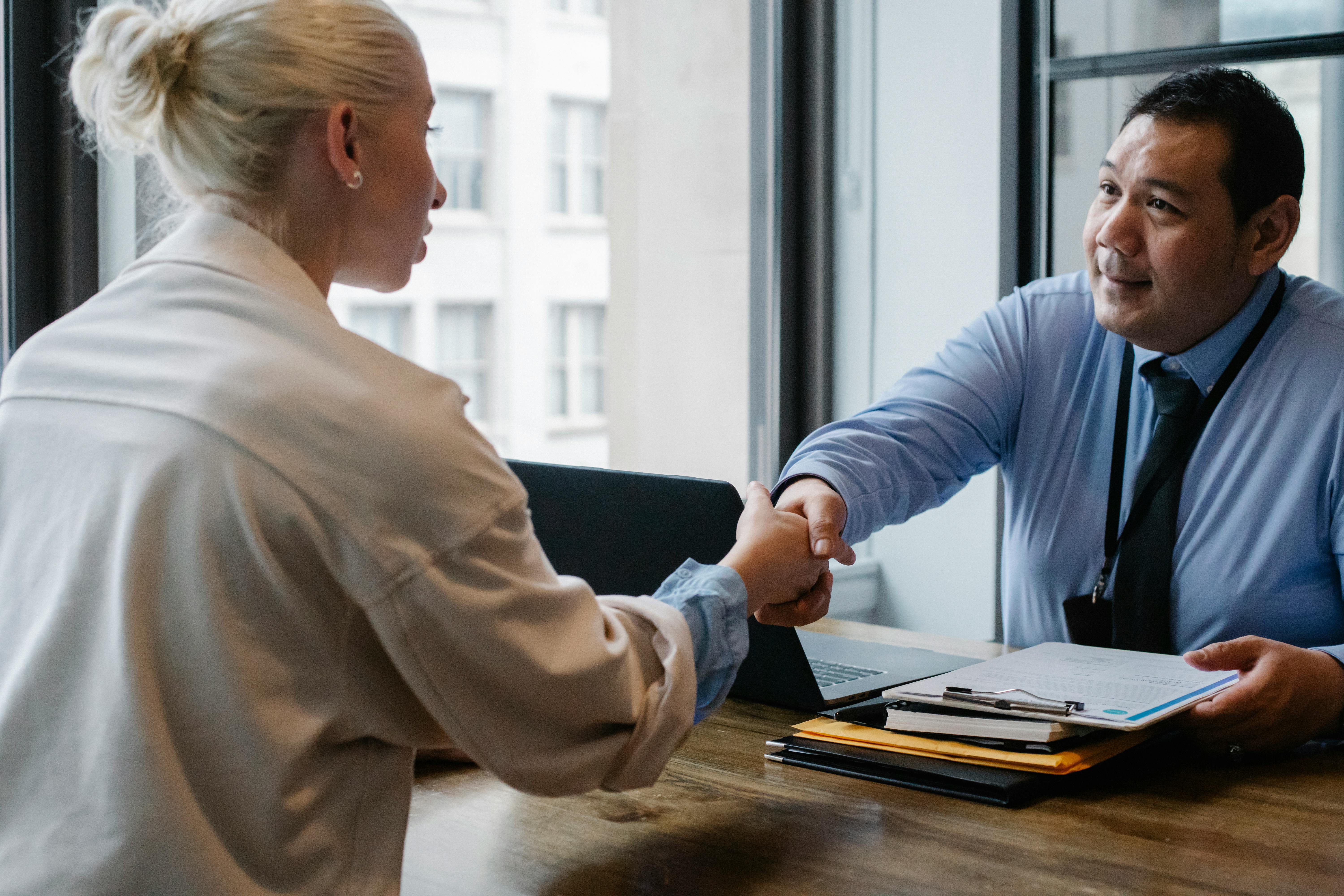 A team of professionals discussing data security and access protocols in a modern office setting.